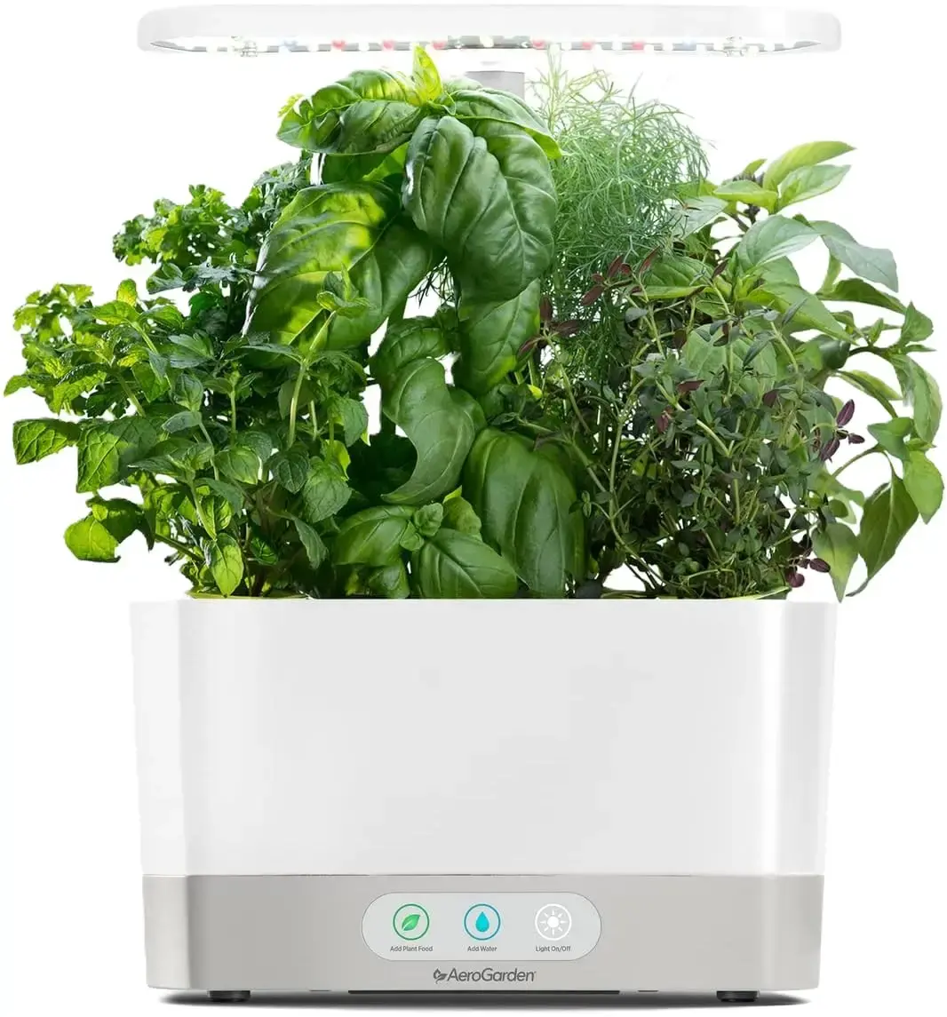 AeroGarden Harvest countertop hydroponic system with LED grow light and 6-pod herb kit